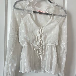 Double layered sheer tie blouse with stars